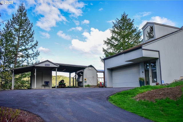 395 Rio Nes Ln, Roseburg, OR 97470 - view of front of home featuring a shed and driveway