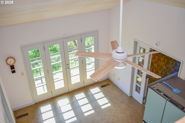 395 Rio Nes Ln, Roseburg, OR 97470 - doorway featuring french doors, vaulted ceiling, and tile patterned flooring