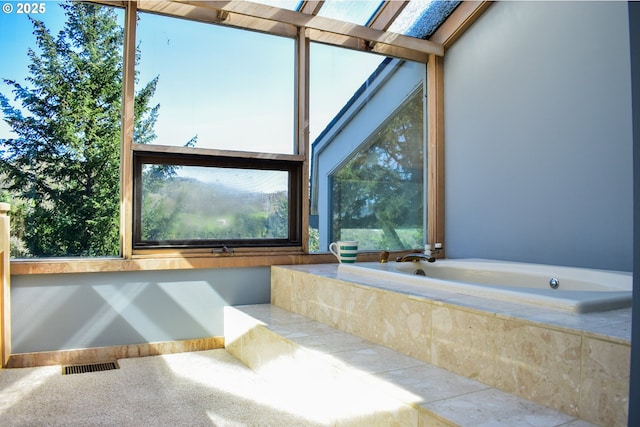 395 Rio Nes Ln, Roseburg, OR 97470 - bathroom featuring a garden tub and plenty of natural light