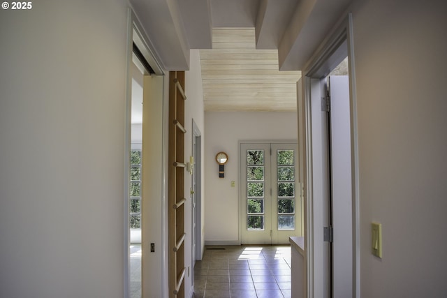 395 Rio Nes Ln, Roseburg, OR 97470 - corridor with tile patterned flooring and baseboards