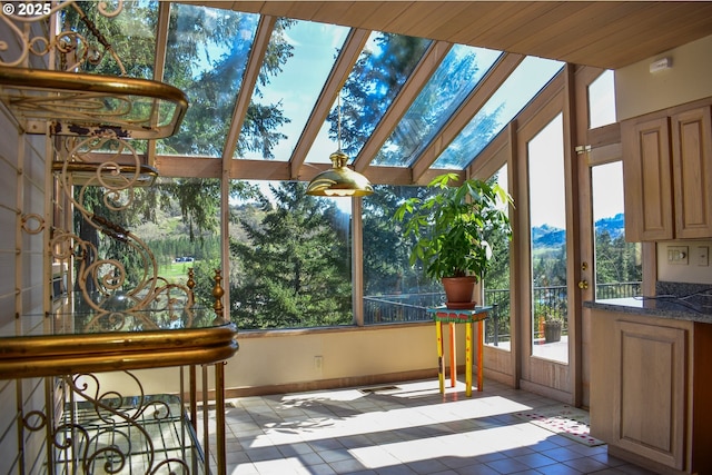 395 Rio Nes Ln, Roseburg, OR 97470 - sunroom featuring tile patterned flooring and a mountain view
