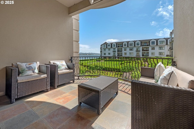 707 N Hayden Island Dr Unit 217, Portland, OR 97217 - balcony with an outdoor hangout area