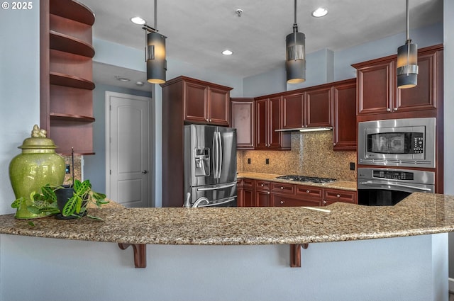 707 N Hayden Island Dr Unit 217, Portland, OR 97217 - kitchen featuring appliances with stainless steel finishes, open shelves, light stone counters, decorative backsplash, and decorative light fixtures