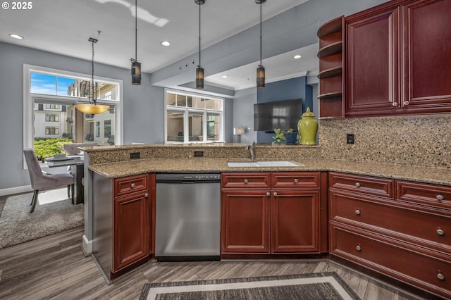 707 N Hayden Island Dr Unit 217, Portland, OR 97217 - kitchen featuring dishwasher, dark brown cabinets, dark wood finished floors, and recessed lighting