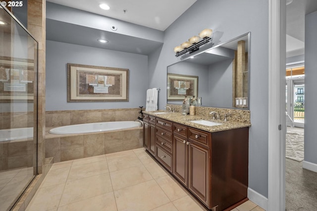 707 N Hayden Island Dr Unit 217, Portland, OR 97217 - full bathroom with a bath, double vanity, a shower stall, tile patterned flooring, and recessed lighting