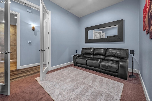 707 N Hayden Island Dr Unit 217, Portland, OR 97217 - carpeted living room with french doors and baseboards