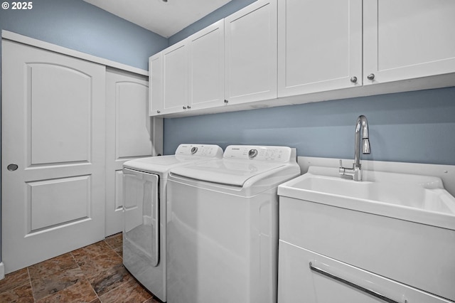 707 N Hayden Island Dr Unit 217, Portland, OR 97217 - laundry area featuring independent washer and dryer and cabinet space