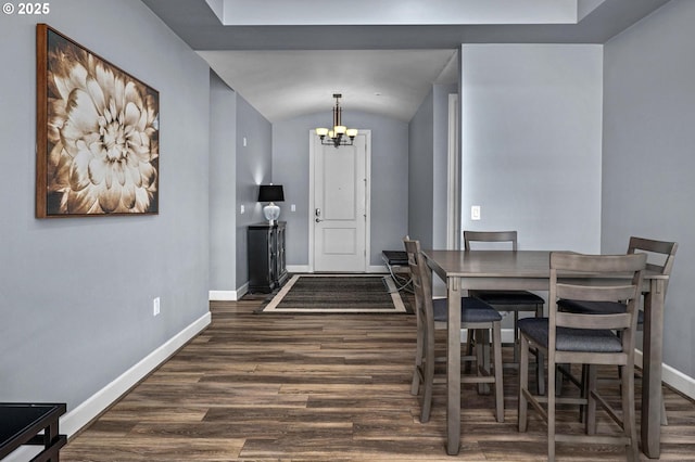 707 N Hayden Island Dr Unit 217, Portland, OR 97217 - dining area featuring wood finished floors, a chandelier, and lofted ceiling