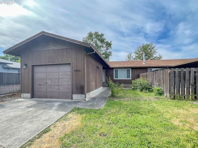 1883 Green Ave, Roseburg, OR 97471 - ranch-style house with concrete driveway and an attached garage