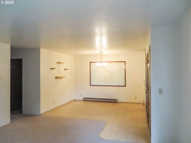 1883 Green Ave, Roseburg, OR 97471 - empty room with a chandelier and a baseboard radiator