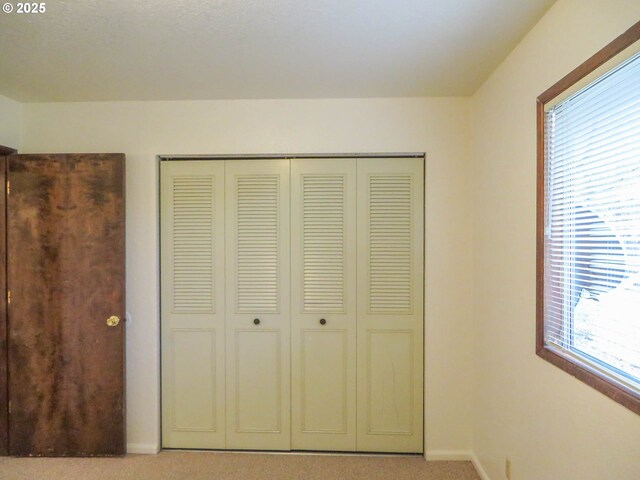 1883 Green Ave, Roseburg, OR 97471 - unfurnished bedroom with carpet, a closet, and baseboards