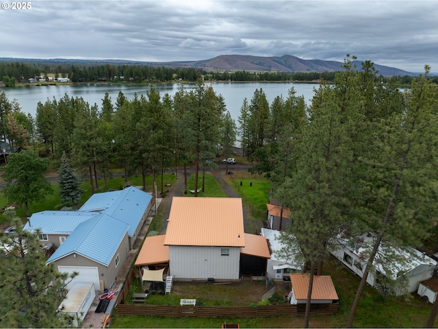 bird's eye view of a water and mountain view