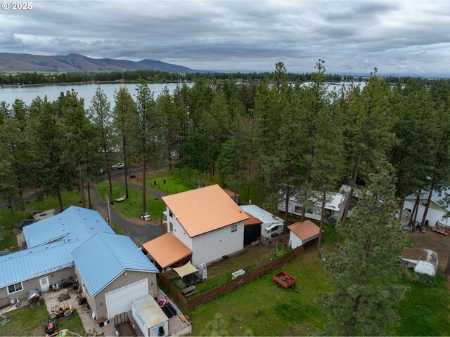 drone / aerial view of a water and mountain view