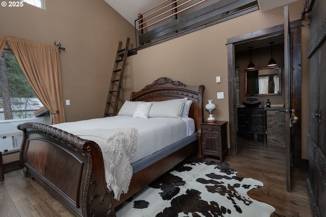 bedroom featuring wood-type flooring