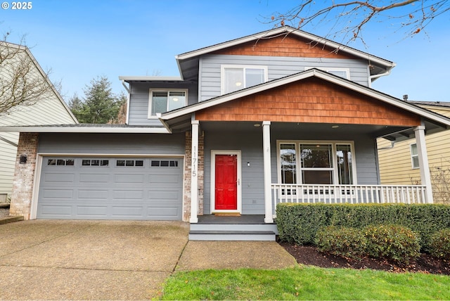 view of front of house featuring a garage and covered porch