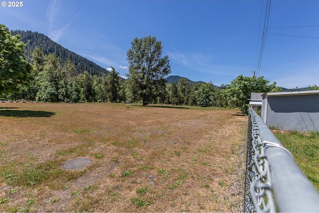 47508 Hansen St, Oakridge, OR 97463 - view of yard featuring a view of trees and a mountain view