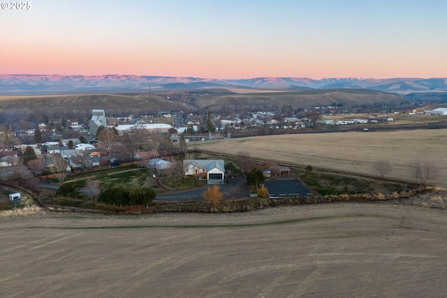 aerial view at dusk with a mountain view