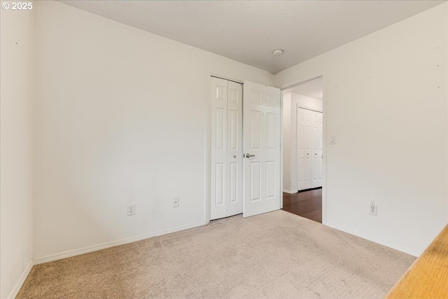 empty room with carpet flooring