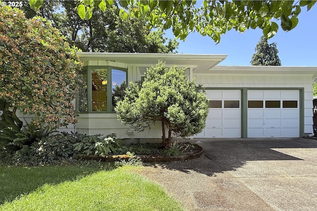 4296 SE Fieldcrest St, Milwaukie, OR 97222 - view of front of house with concrete driveway and a garage