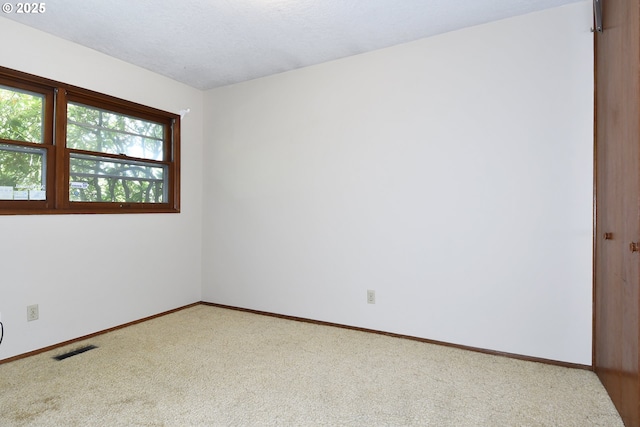 4296 SE Fieldcrest St, Milwaukie, OR 97222 - carpeted spare room featuring baseboards