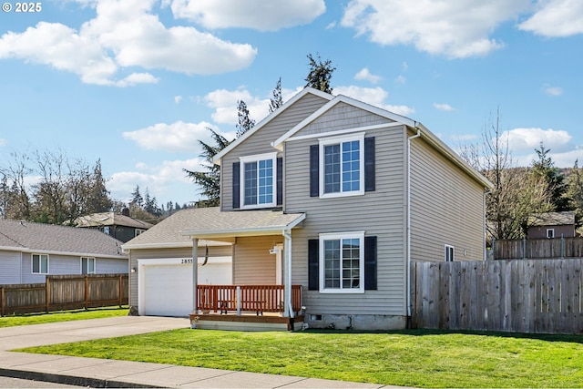 traditional-style home featuring concrete driveway, a front lawn, and fence