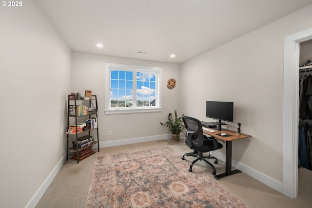 office area featuring light carpet, recessed lighting, visible vents, and baseboards