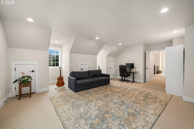 living area with lofted ceiling, light colored carpet, and recessed lighting