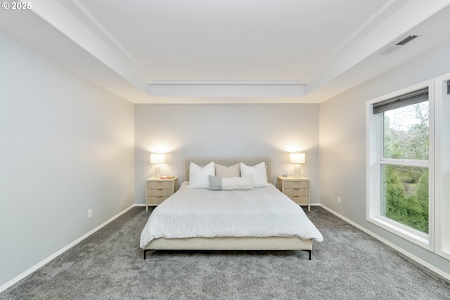 bedroom featuring visible vents, baseboards, and carpet flooring