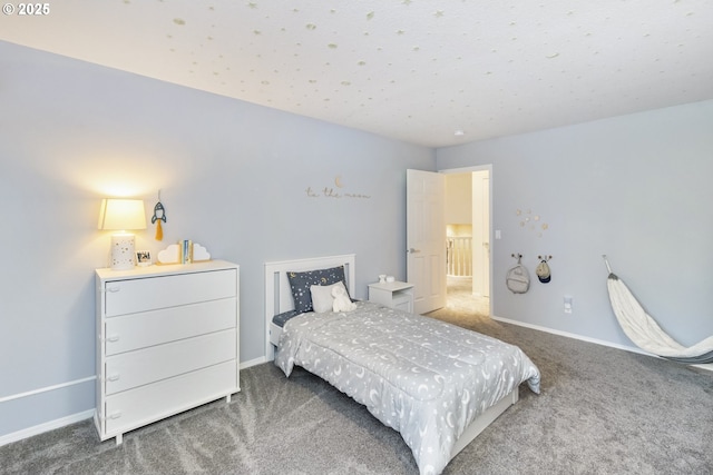 bedroom featuring baseboards and carpet floors