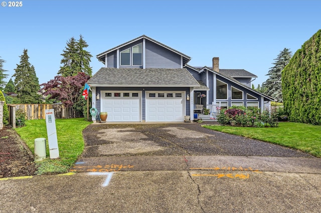 1543 NE Hyde St, Hillsboro, OR 97124 - mid-century home with a chimney, roof with shingles, a garage, and driveway
