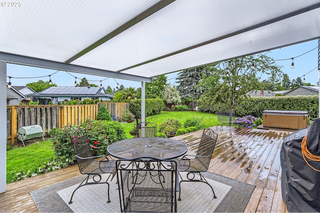 1543 NE Hyde St, Hillsboro, OR 97124 - wooden deck featuring a hot tub and outdoor dining space