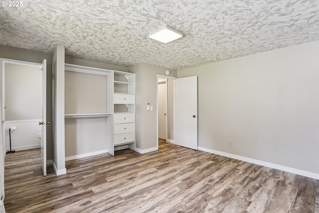 1213 NW Westridge St, Vancouver, WA 98665 - unfurnished bedroom featuring wood finished floors and a closet