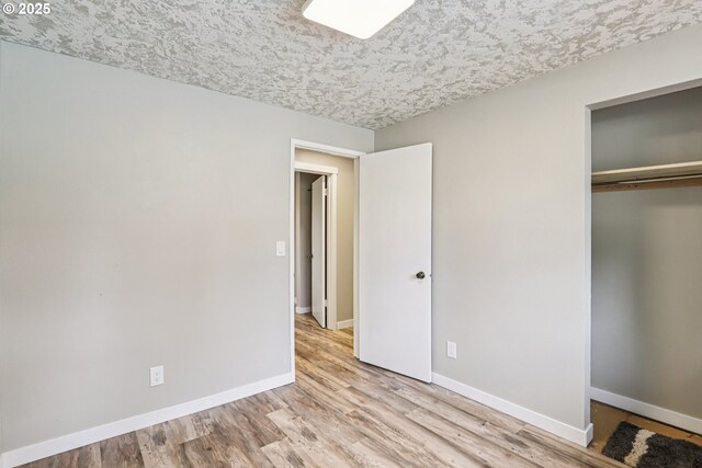 1213 NW Westridge St, Vancouver, WA 98665 - unfurnished bedroom featuring a closet and wood finished floors