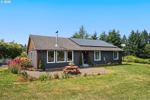 40774 SE Trubel Rd, Sandy, OR 97055 - ranch-style home featuring roof mounted solar panels, a front lawn, and roof with shingles