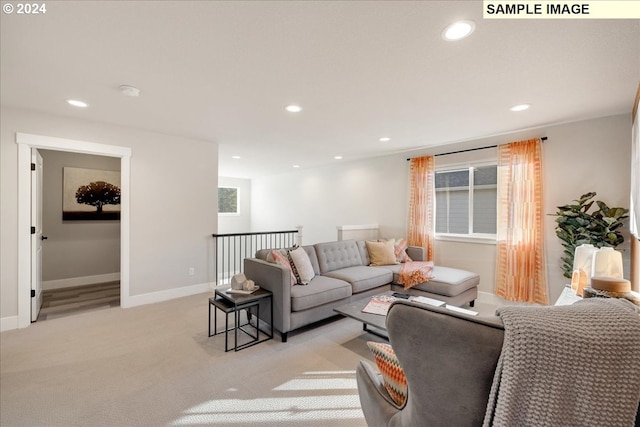 living room with light colored carpet