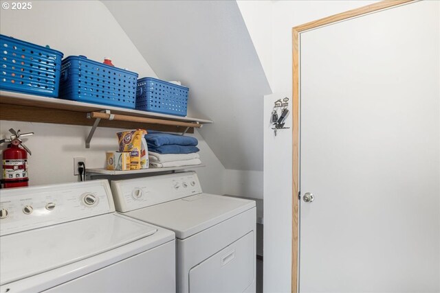 washroom featuring laundry area and washer and clothes dryer