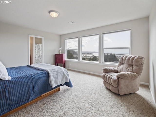 4257 SE Jetty Ave, Lincoln City, OR 97367 - carpeted bedroom featuring baseboards and visible vents