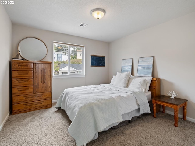 4257 SE Jetty Ave, Lincoln City, OR 97367 - bedroom featuring visible vents, carpet floors, and baseboards
