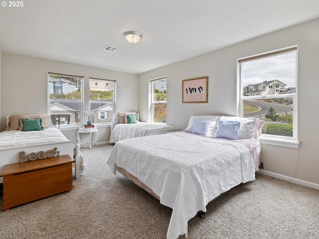 4257 SE Jetty Ave, Lincoln City, OR 97367 - carpeted bedroom with visible vents and baseboards