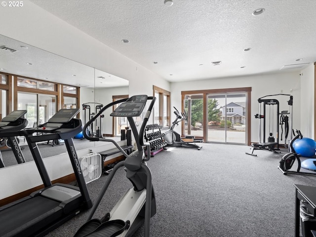4257 SE Jetty Ave, Lincoln City, OR 97367 - exercise room featuring visible vents, a textured ceiling, and carpet floors