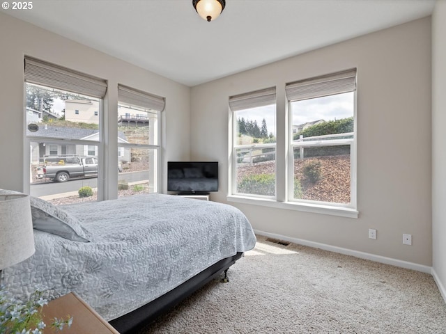 4257 SE Jetty Ave, Lincoln City, OR 97367 - carpeted bedroom featuring visible vents and baseboards