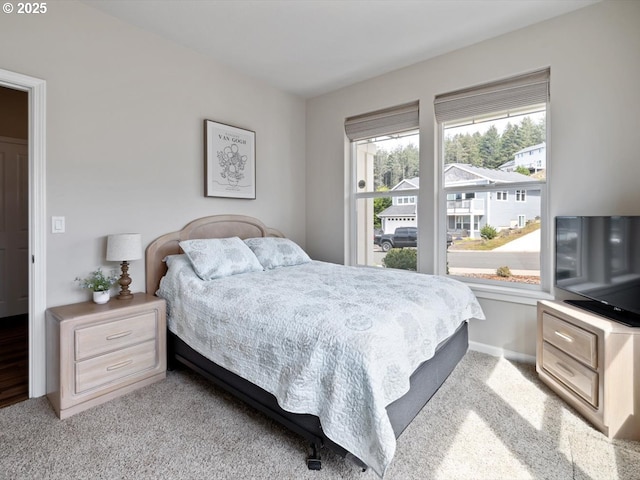 4257 SE Jetty Ave, Lincoln City, OR 97367 - bedroom featuring light colored carpet and baseboards
