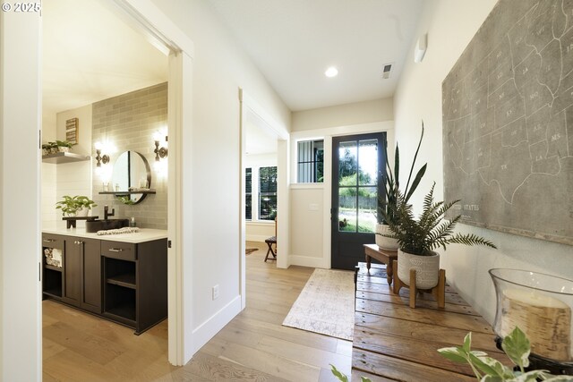 1931 13th St, West Linn, OR 97068 - hall featuring light wood-style floors and recessed lighting
