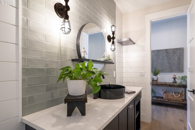 1931 13th St, West Linn, OR 97068 - bathroom featuring vanity, wood finished floors, and tile walls