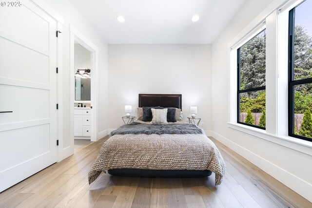 1931 13th St, West Linn, OR 97068 - bedroom with light wood finished floors, recessed lighting, and ensuite bathroom