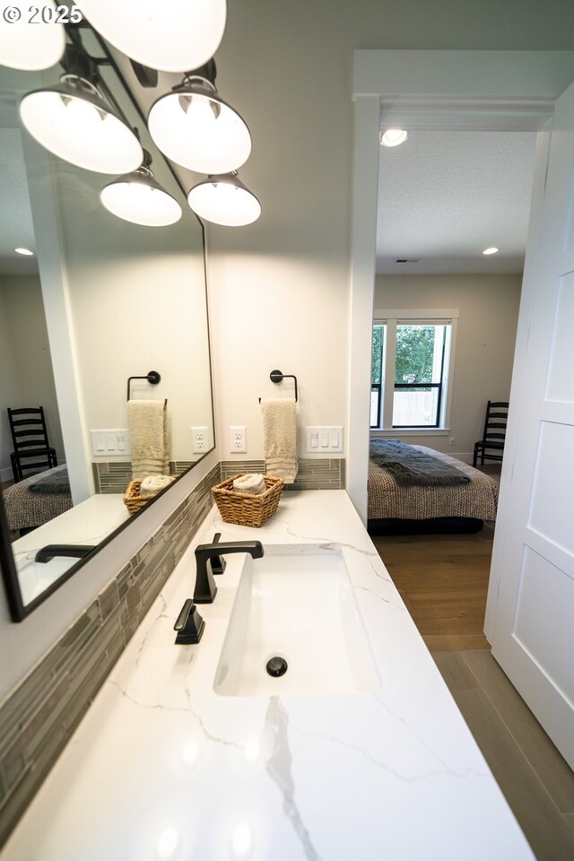 1931 13th St, West Linn, OR 97068 - bathroom featuring ensuite bathroom, wood finished floors, and vanity