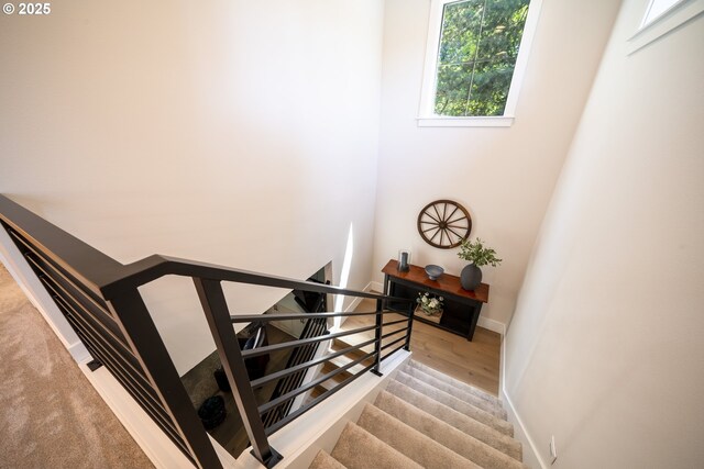 1931 13th St, West Linn, OR 97068 - staircase featuring baseboards and wood finished floors
