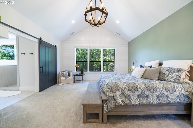 1931 13th St, West Linn, OR 97068 - bedroom with a barn door, vaulted ceiling, carpet flooring, recessed lighting, and wooden walls