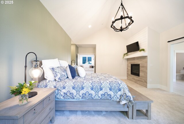 1931 13th St, West Linn, OR 97068 - carpeted bedroom featuring a chandelier, high vaulted ceiling, a barn door, and a fireplace