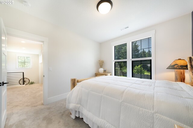 1931 13th St, West Linn, OR 97068 - bedroom featuring light colored carpet and baseboards